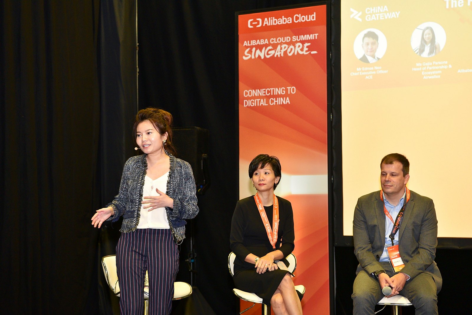 Speaking on stage at a regional business summit