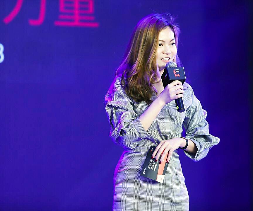 Speaking on stage at a launch event in Shanghai
